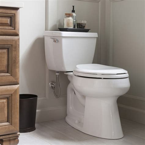 Kohler highline white elongated chair height 2 piece watersense toilet - Easy to install with included slow-close toilet seat ($30 value) Class 5 Flush exposes 90% less seal material (see video) Comfort Height offers chair-height seating (about 2 in. taller) View More Details 